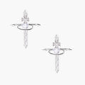 White gold plated cross earrings with orbital ring & zirconia stones on cream background