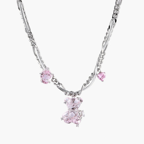 Silver twisted chain necklace with fairy tale carriage pendant adorned with pink cubic zirconia gemstones