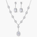 Elegant white gold plated jewelry set with oval cubic zirconia stones in halo settings, featuring Y-necklace and drop earrings.